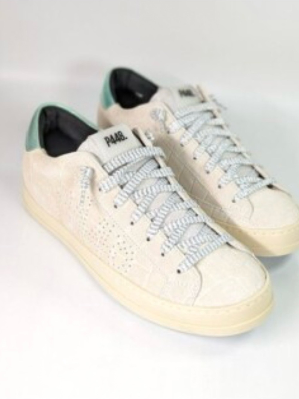 P440 sneakers size 10